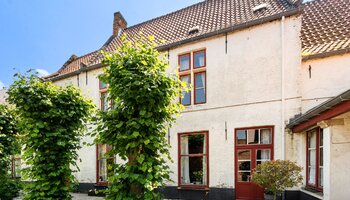 Polyvalent handelshuis met horecazaak/privéwoning/ruim terras/privé-parking