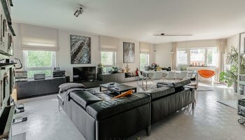 Uitzonderlijke 'villa in the sky' - triplex app - met groot zongericht terras 