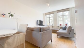 Opbrengsteigendom met mogelijkheid tot praktijk en duplex-appartement met dakterras vlakbij het Astridpark