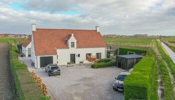 Exclusieve hoeve met apart bijgebouw op toplocatie (5.550 m² grond)