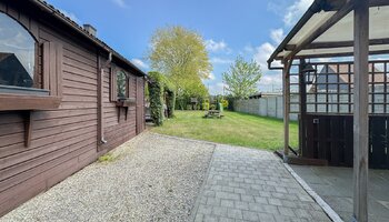 Te renoveren halfopen woning met zonnige tuin op toplocatie