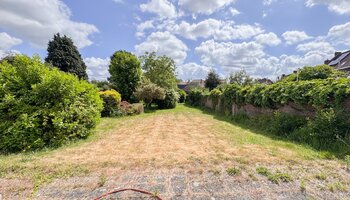 Bien polyvalent avec grand espace habitable et jardin ensoleillé