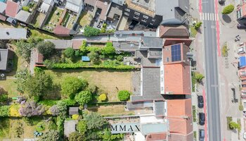 Bien polyvalent avec grand espace habitable et jardin ensoleillé