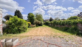 Bien polyvalent avec grand espace habitable et jardin ensoleillé