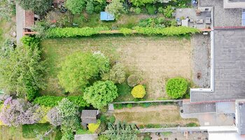 Bien polyvalent avec grand espace habitable et jardin ensoleillé