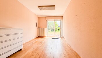 Bien polyvalent avec grand espace habitable et jardin ensoleillé