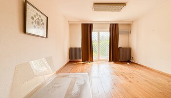 Bien polyvalent avec grand espace habitable et jardin ensoleillé