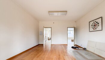 Bien polyvalent avec grand espace habitable et jardin ensoleillé