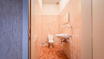 Bien polyvalent avec grand espace habitable et jardin ensoleillé