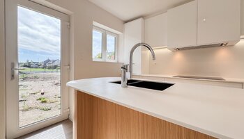 Instapklare woning met 4 slaapkamers, zonnige tuin en garage