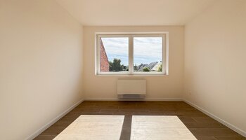 Halfopen woning met zongerichte tuin en inpandige garage
