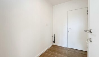 Halfopen woning met zongerichte tuin en inpandige garage