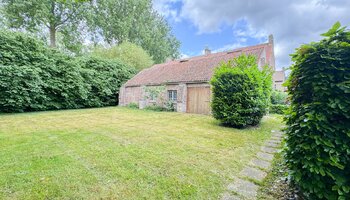 Achtergrond 705m2 met schuur 130m2