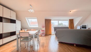 Ruim duplex-appartement met 2SLK gelegen in het hart van Heist-aan-Zee