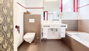 Commerciële opbrengsteigendom met horeca & gastenkamers op topligging 