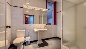 Commerciële opbrengsteigendom met horeca & gastenkamers op topligging 