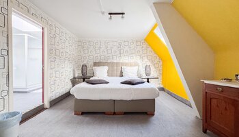 Commerciële opbrengsteigendom met horeca & gastenkamers op topligging 