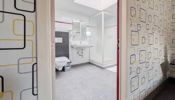 Commerciële opbrengsteigendom met horeca & gastenkamers op topligging 