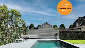 Open bebouwing met zongerichte tuin en zwembad