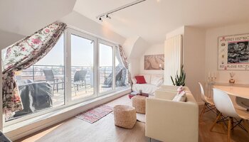 Duplex avec 3 chambres, grande terrasse ensoleillée et vue exceptionnellement dégagée