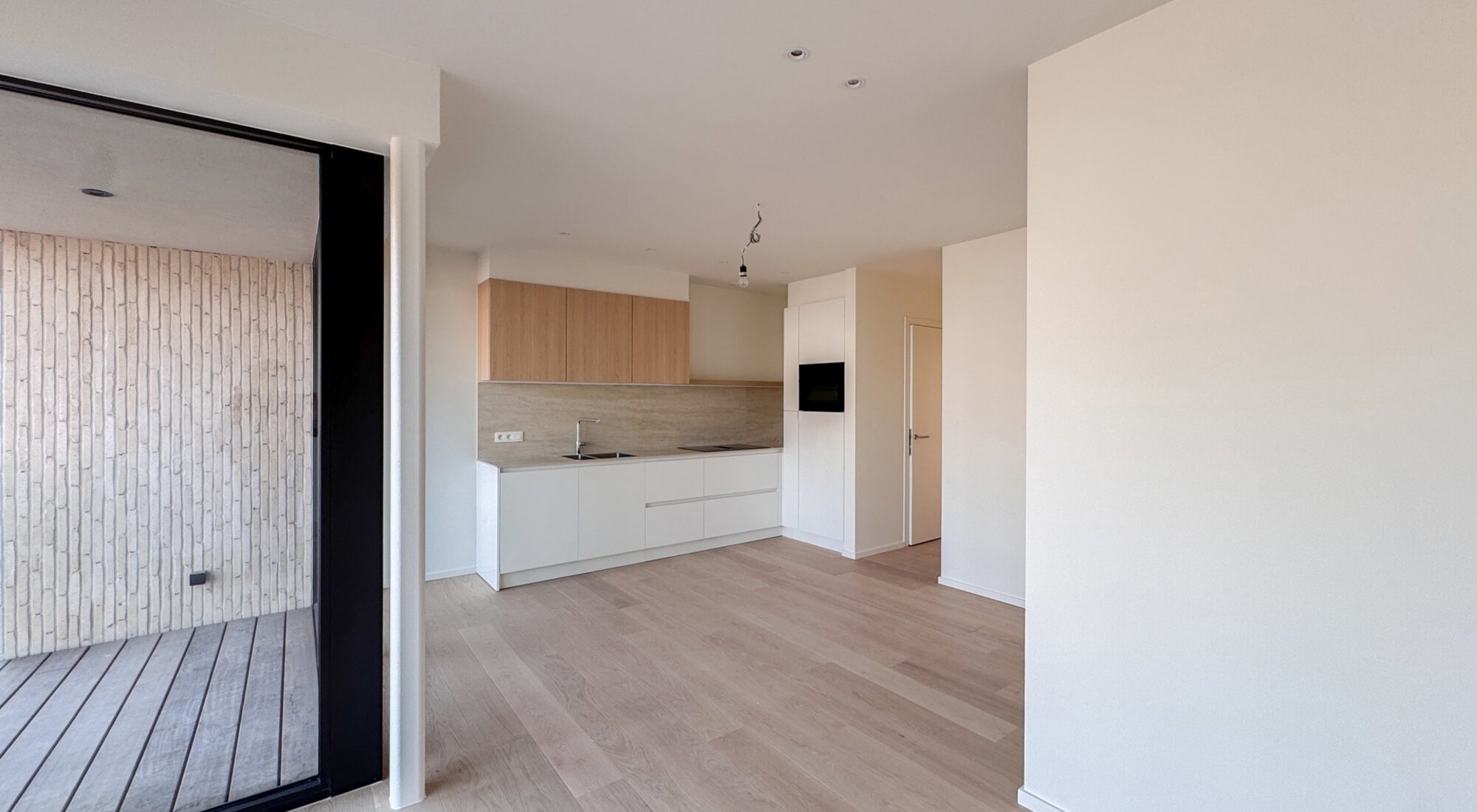 Uniek nieuwbouwappartement met 2-SLK en open zicht op het Maurice Lippensplein