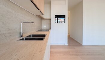 Uniek nieuwbouwappartement met 2-SLK en open zicht op het Maurice Lippensplein