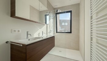 Uniek nieuwbouwappartement met 2-SLK en open zicht op het Maurice Lippensplein