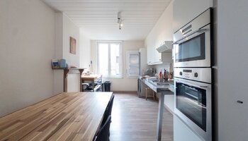 Maison à rénover avec garage intégré, située à proximité du lac de Zegem