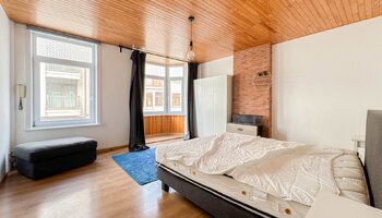 Maison à rénover avec garage intégré, située à proximité du lac de Zegem