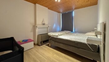 Maison à rénover avec garage intégré, située à proximité du lac de Zegem