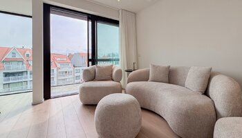 Appartement neuf unique de 2 chambres avec vue sur la place Driehoeksplein, dans le quartier du Zoute