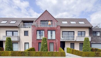 Instapklaar appartement met 2 slaapkamers & inpandige garage