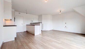 Instapklaar appartement met 2 slaapkamers & inpandige garage