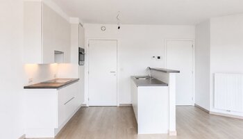 Instapklaar appartement met 2 slaapkamers & inpandige garage