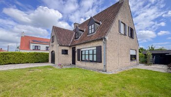 Open bebouwing met zuidwest gerichte tuin op ruim perceel
