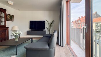 Ruim en lichtrijk 2-slaapkamerappartement met zonnig terras in hartje Sint-Michiels