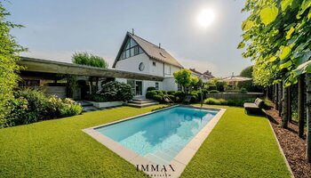 Exclusief wonen met zwembad, omgeven door groen