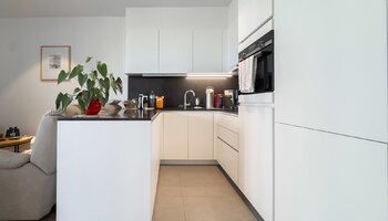 Appartement d'investissement récent avec place de parking