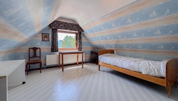 Villa à rénover sur un vaste terrain de 650 m² dans un quartier résidentiel