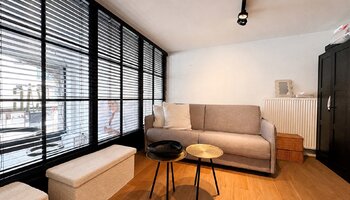 Handelspand met appartement nabij het Driehoeksplein, Lichttorenplein en de zee