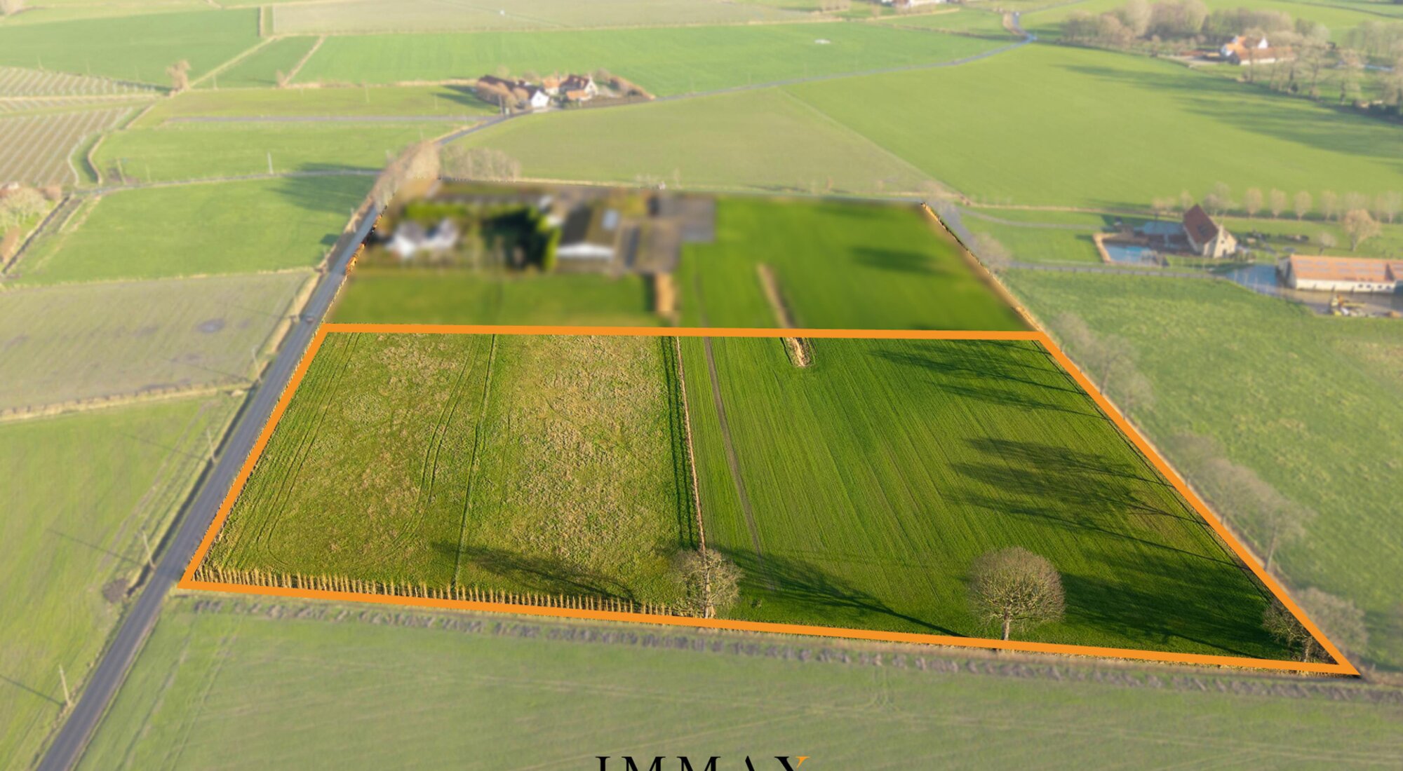 Ruim perceel weiland/bouwland op landelijke ligging vlakbij Damse Vaart