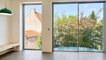 Sfeervol duplexappartement met authentieke charme aan de Ezelpoort