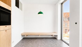 Sfeervol duplexappartement met authentieke charme aan de Ezelpoort