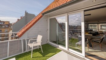 Uniek duplex appartement met privé-lift en ruime terrassen nabij het Rubensplein