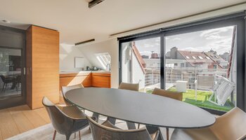 Uniek duplex appartement met privé-lift en ruime terrassen nabij het Rubensplein