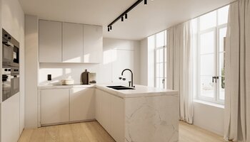 High-end hoekappartement met zonneterras en zicht op de Dijver