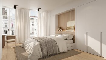 High-end hoekappartement met zonneterras en zicht op de Dijver